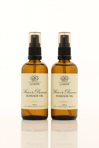 Two bottles of Lhami Arnica & Rosemary Massage Oil on a white background